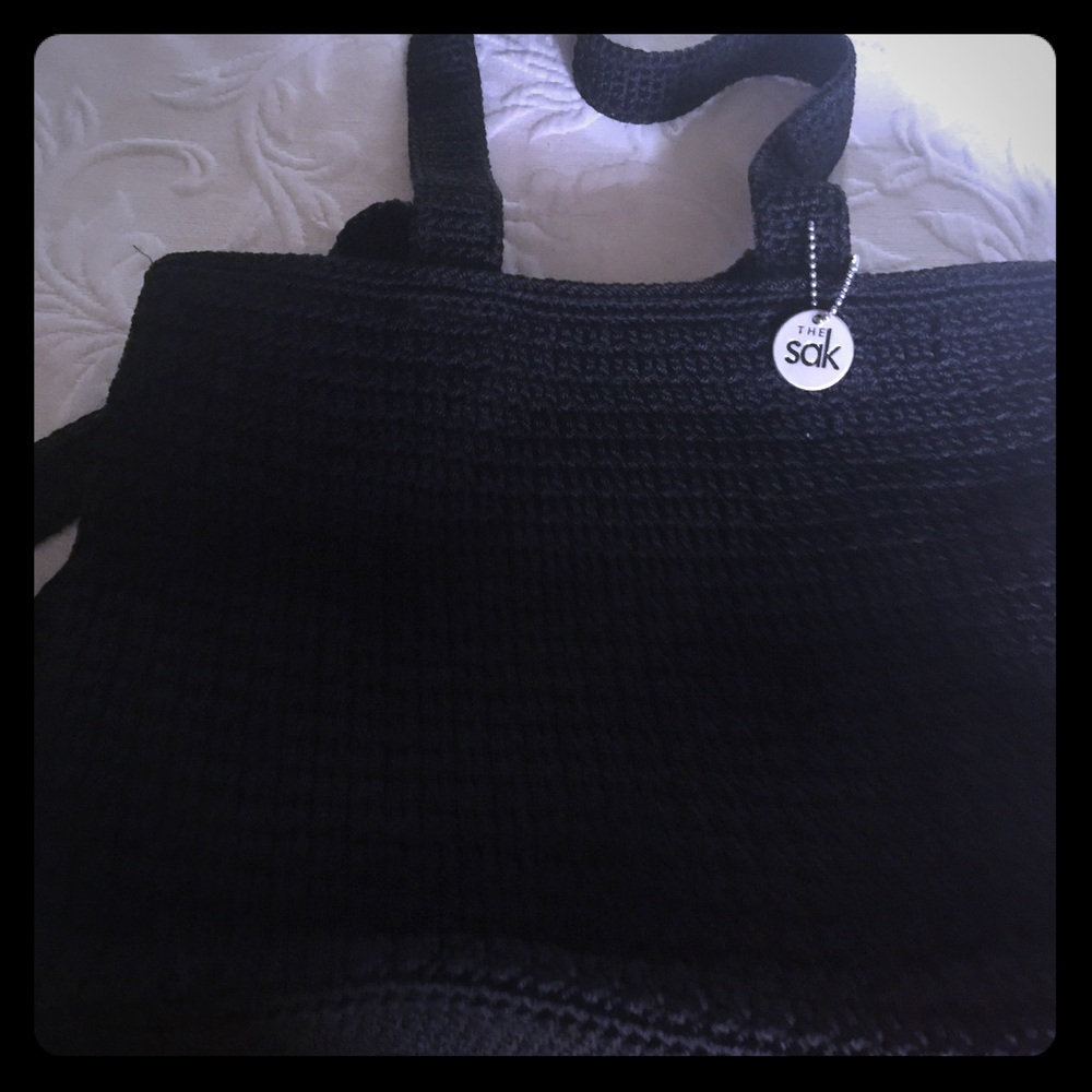 👛 Black Sak purse with zippered top.